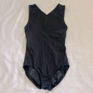 Size 8 Ivivva blk leotard with bum grips for hold, barely worn,great condition